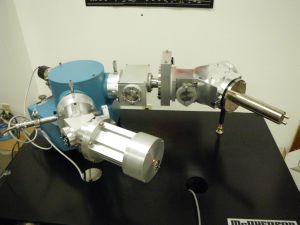 vacuum UV source with efficient monochromator and exit accessory for detector comparison